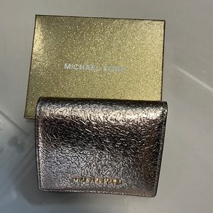 Michael Kors rose gold metallic leather wallet